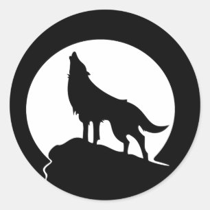 Wolf howling with a full moon round sticker