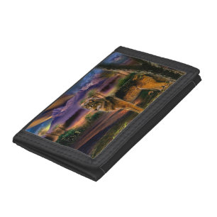 Wolf hunting in mountain tri-fold wallet