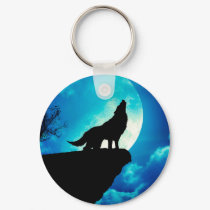 Wolf in silhouette howling to the full moon keychain
