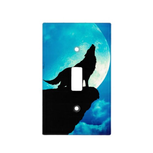 Wolf in silhouette howling to the full moon light switch cover