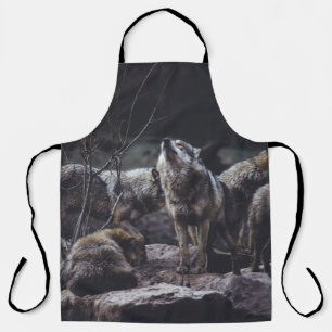 WOLF PACK ON ROCK FORMATION APRON