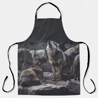 WOLF PACK ON ROCK FORMATION APRON