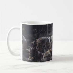 WOLF PACK ON ROCK FORMATION COFFEE MUG