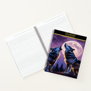 Wolves howling at the moonlit sky notebook