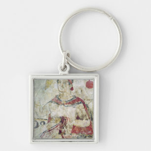 Woman at her toilet, detail from a funerary keychain