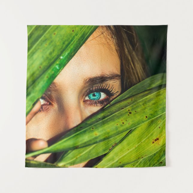 Woman behind green leaves tapestry (Front)