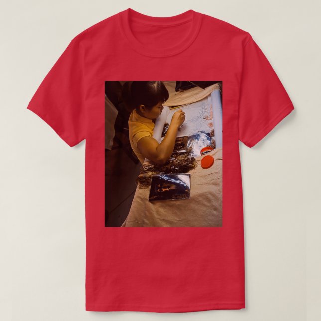 Woman Concentrating On Stitching Graphic  T-Shirt (Design Front)