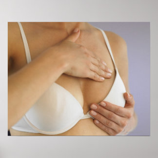 Woman doing breast self exam poster