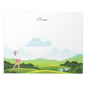 Woman golfer is teeing off on fairway Notepad