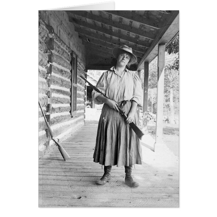 Woman holding a rifle on a porch cards