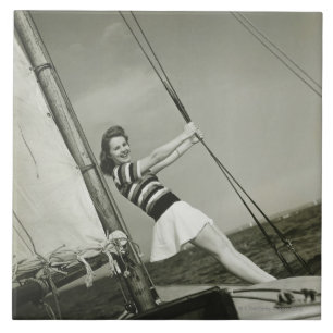 Woman Holding Rigging on Yacht Ceramic Tile