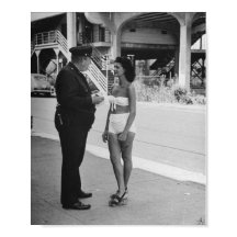 Woman in a Bathing Suit Getting a Ticket