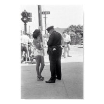 Woman in a Bathing Suit Getting a Ticket