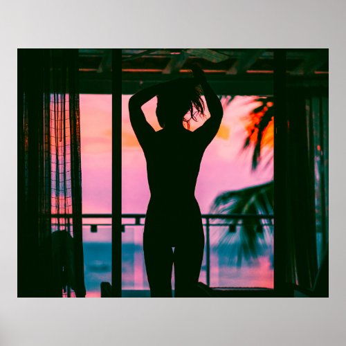 Woman in black tank top and pants standing on blac poster