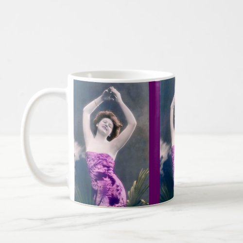 woman in purple sarong  arms raised as if dancing coffee mug
