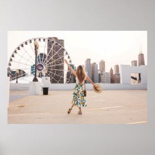 Woman in white and blue floral dress holding hat poster