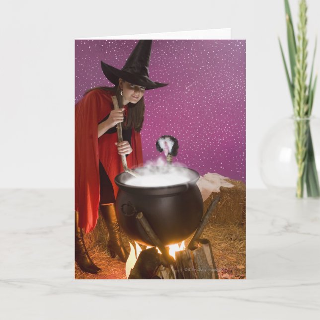Woman in witch costume stirring caldron card (Front)