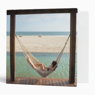 Woman Laying On A Hammock At A Small Hotel Binder