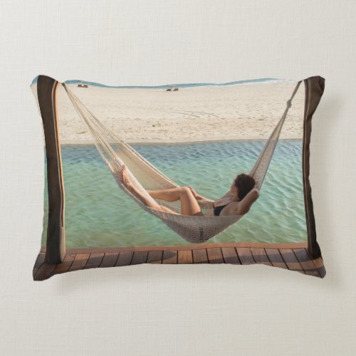 Woman Laying On A Hammock At A Small Hotel Decorative Pillow