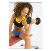 Woman lifting weights (Front)