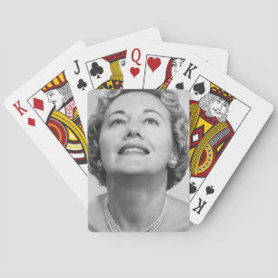 Woman Looking Up Poker Cards