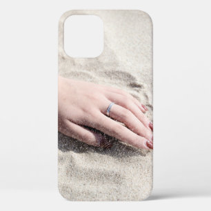 Woman lying on white sand iPhone 12 case