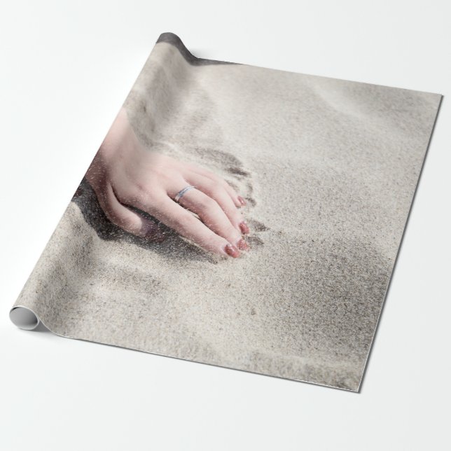 Woman lying on white sand wrapping paper (Unrolled)