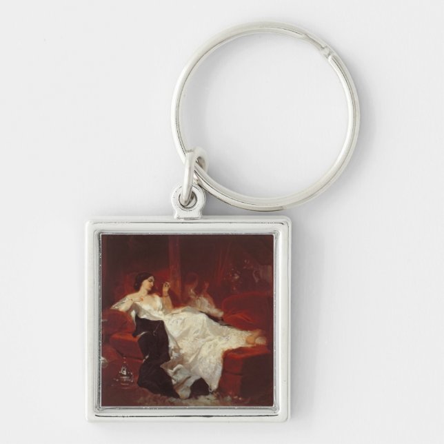 Woman on a red sofa keychain (Front)