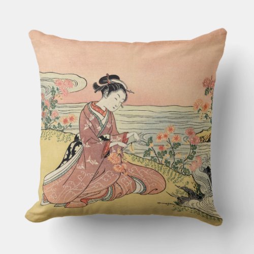 Woman picking chrysanthemums throw pillow