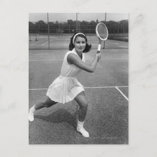 Woman playing tennis postcard