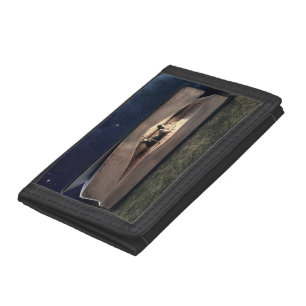 Woman Reading Inside Book at Night Tri-fold Wallet