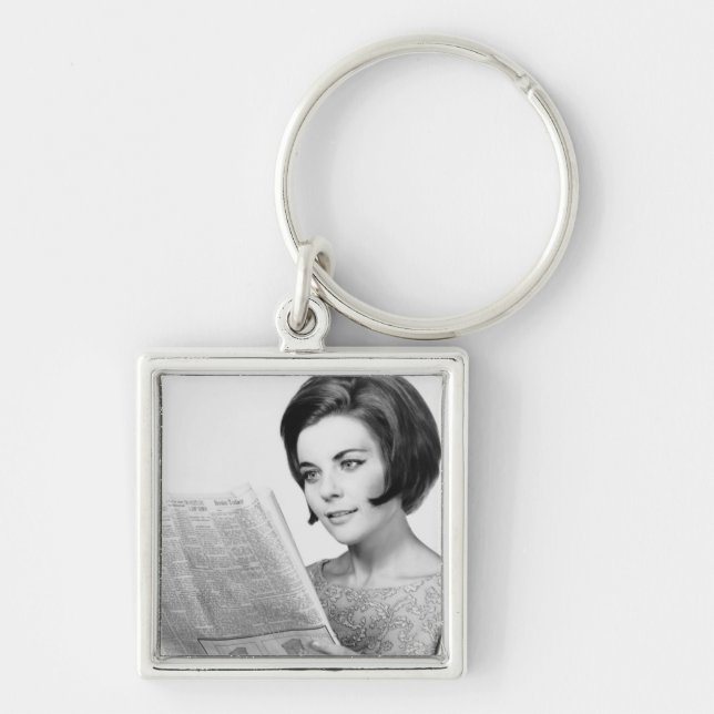 Woman Reading Newpaper Keychain (Front)