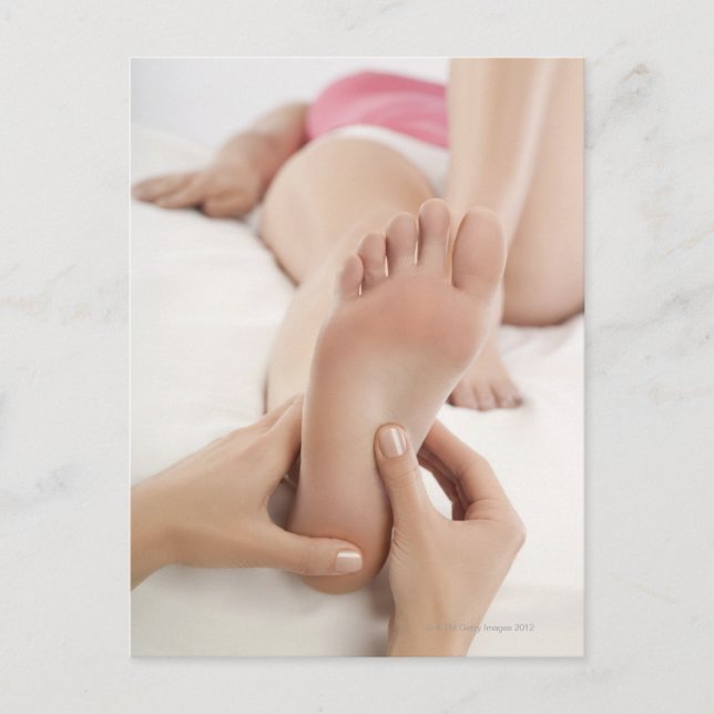 Woman receiving foot massage postcard (Front)