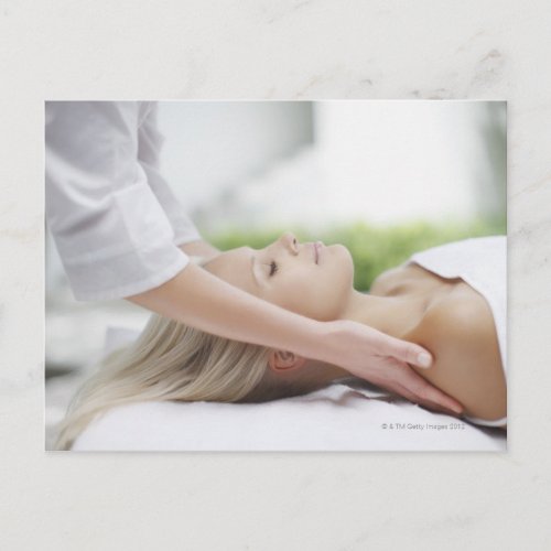 Woman receiving massage postcard