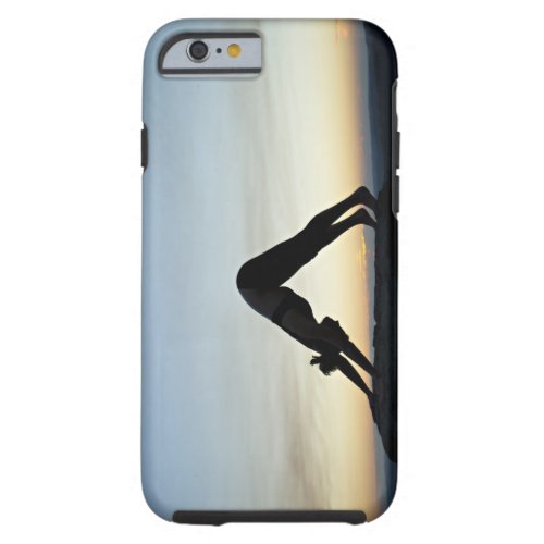 woman silhouetted against the sunset practicing tough iPhone 6 case