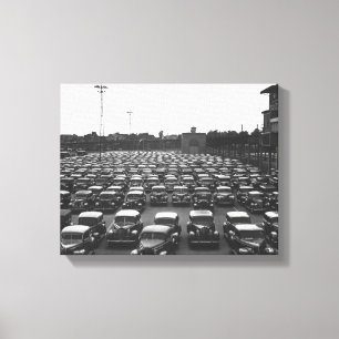 Woman sitting by fireplace B&W Canvas Print