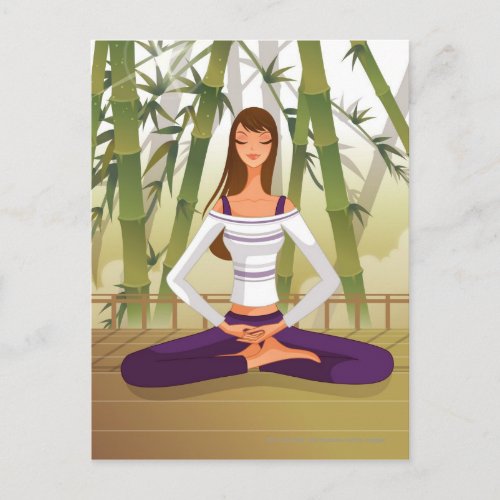 Woman sitting in lotus position meditating postcard