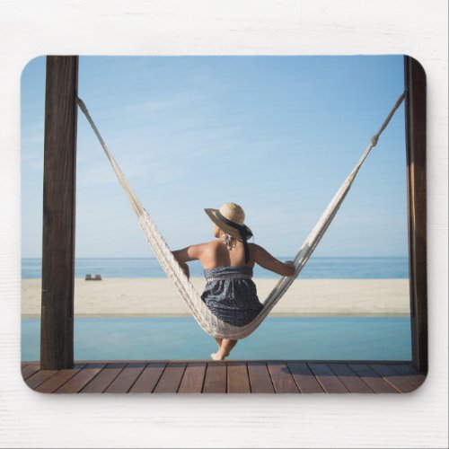 Woman Sitting On A Hammock At A Small Hotel Mouse Pad