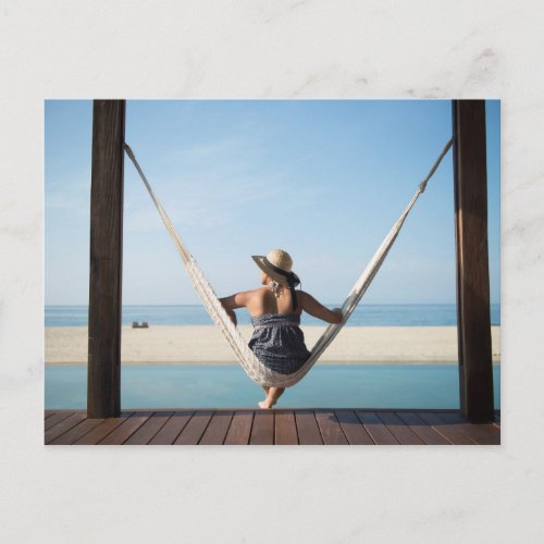 Woman Sitting On A Hammock At A Small Hotel Postcard