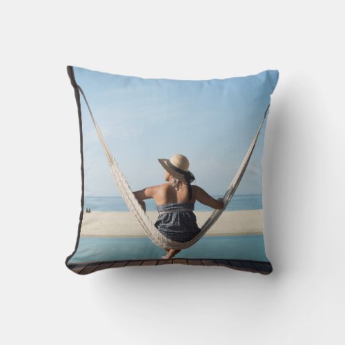 Woman Sitting On A Hammock At A Small Hotel Throw Pillow