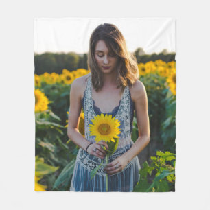 Woman standing at sunflower field fleece blanket