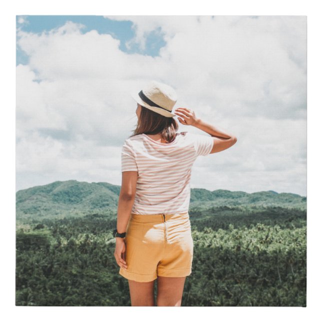 Woman standing near trees faux canvas print (Front)
