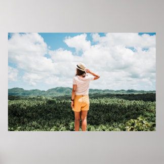 Woman standing near trees poster