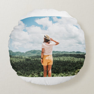 Woman standing near trees round pillow