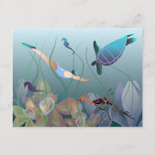 Woman swimming underwater with turtle postcard