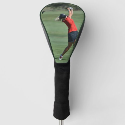Woman swinging a Golf field Driver Golf Head Cover