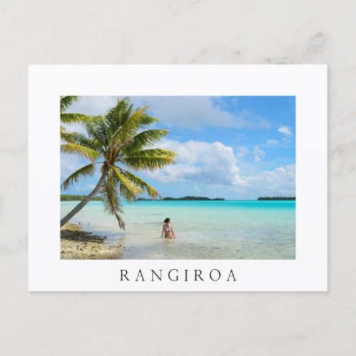 Woman under a palm tree Rangiroa postcard