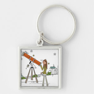 Woman using an astronomy telescope keychain