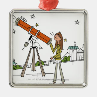 Woman using an astronomy telescope metal ornament
