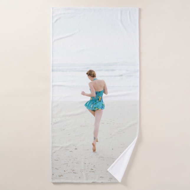 Woman walking on shore near beach bath towel (Bath Towel)